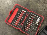 a tool kit that is sitting on the floor