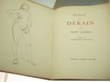 an open book with a drawing of a man on it