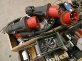 a box full of assorted electrical equipment on the floor
