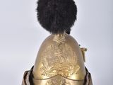 an old helmet with a fur ball on top of it