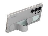 a cell phone with a camera attached to the back of it