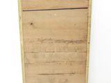 a wooden box with a rope on top of it