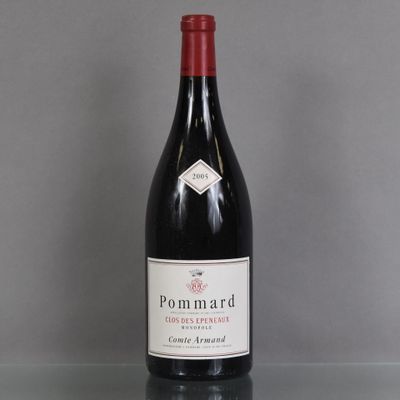 a close up of a bottle of wine on a table