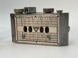an old fashioned radio sitting on top of a white surface