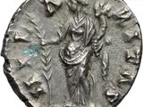 a close up of a silver coin with a man on it