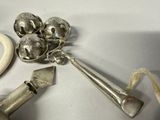 a spoon, spoon rest, and other items on a table