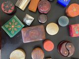 a lot of small wooden objects on the table