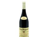 a bottle of wine that is sitting on a table