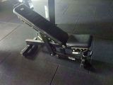 a bench that is sitting on the ground in the gym