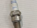 a close up of a spark spark on a white surface