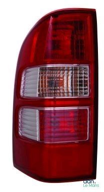 a close up of the tail light of a red car