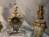 three different types of clocks on display in a glass case