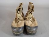 a pair of shoes that have been worn by a person