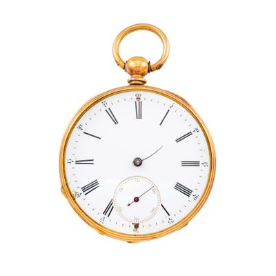 une montre de poche en or avec des chiffres romains sur le cadran
