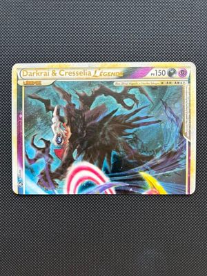 a close up of a card with a picture of a demon on it