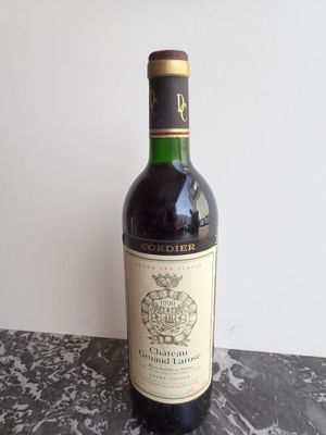 a bottle of wine that is sitting on a table
