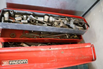 many tools in a red box on top of each other