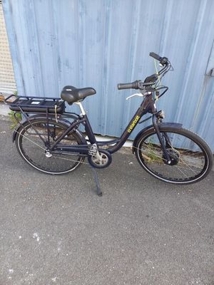 a bicycle that is parked in front of a building