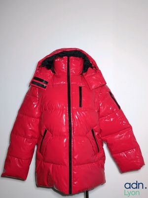 the jacket is red with black trims and a hood