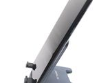 a cell phone that is sitting on top of a stand