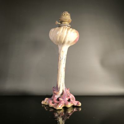 a figurine that has a crown on top of it