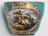 a blue vase with a picture of a woman and a child on it