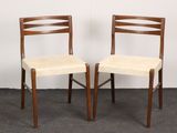 pair of mid century danish teak dining chairs