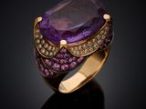 an amethorate and pink tourmaline ring set in 18k yellow gold