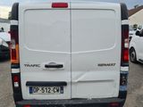a white van that is parked in a parking lot