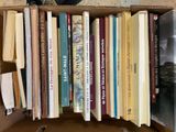 a box full of books sitting on a table