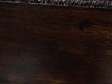 a close up of a piece of wood that has been stained