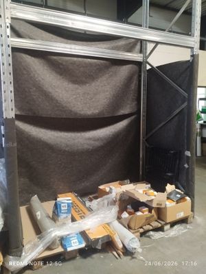 a room with a lot of boxes and boxes on the floor