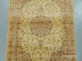 an antique persian rug with a floral design on a beige ground