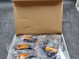 a box of assorted items in it on the floor