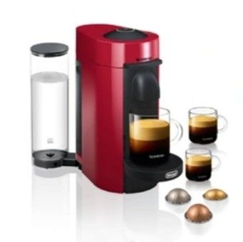 a close up of a red coffee machine with two cups of coffee