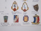 a drawing of a bunch of badges on a piece of paper
