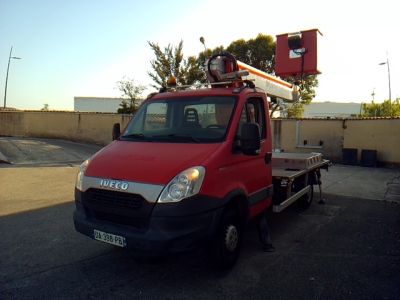 a red truck that is parked in the parking lot