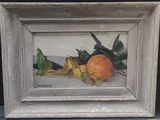 a picture of a painting of an orange on a table