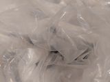 a bag of toilet paper sitting on top of a table