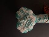 a close up of a decorative object on a wall