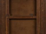 an old wooden cabinet with a glass door and a shelf