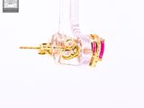 a picture of a pair of earrings with pink stones on them
