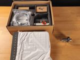 a box that has some items in it on a table