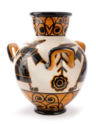 a black and white vase with an orange design on it