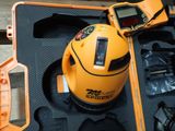 a yellow helmet with a camera and other items in a case