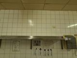 a picture of a kitchen with a stove and a sink