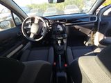 a picture of a car with a steering wheel and dashboard