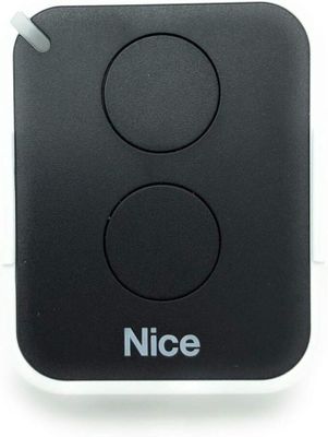 an image of a close up of a remote control on a white surface