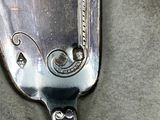 a spoon that is sitting on a table