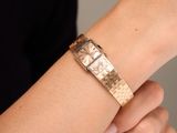 a close up of a person ' s wrist with a watch on it